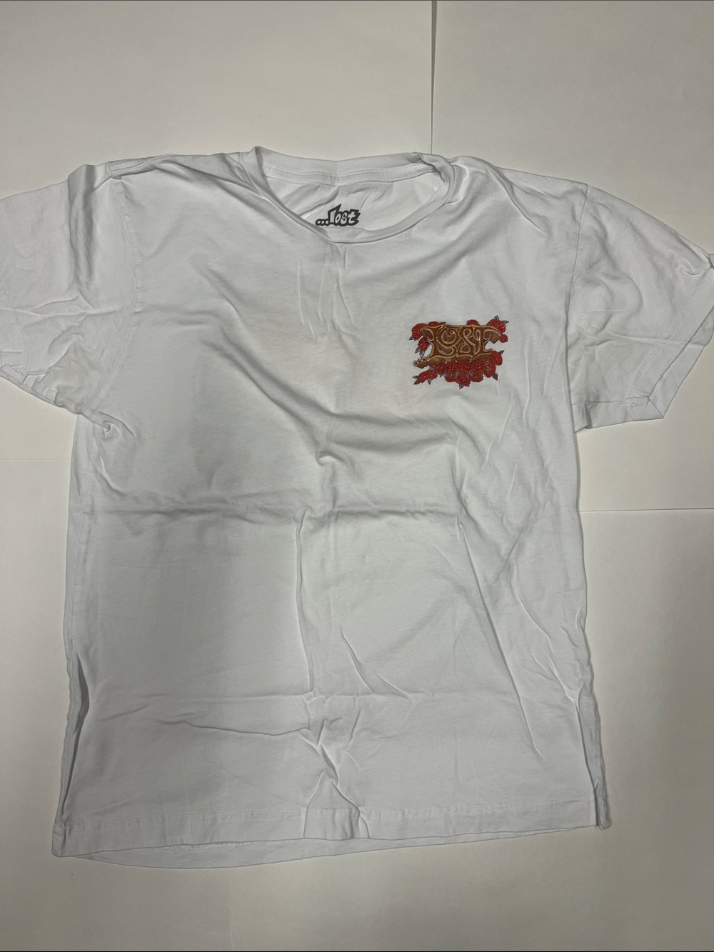 Lost White Tee with Red Rose Cluster and Gold Script Logo
